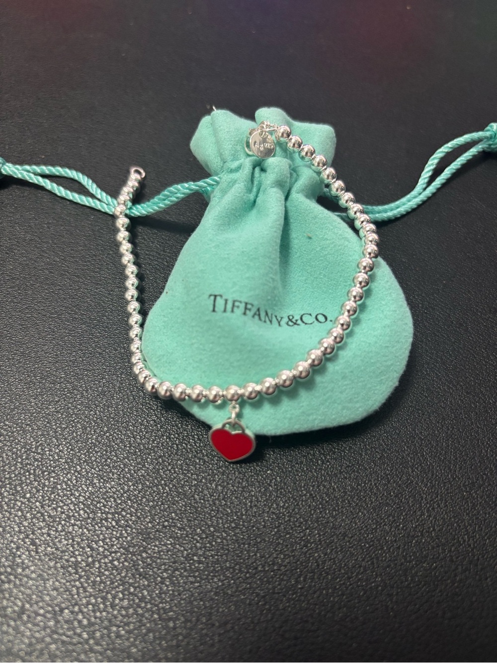 Tiffany & Co. Silver Beaded Bracelet with Red Heart Charm